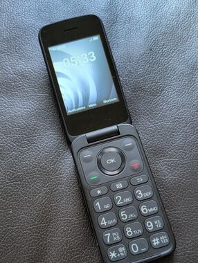 TCL Black Flip Phone with Numeric Keypad